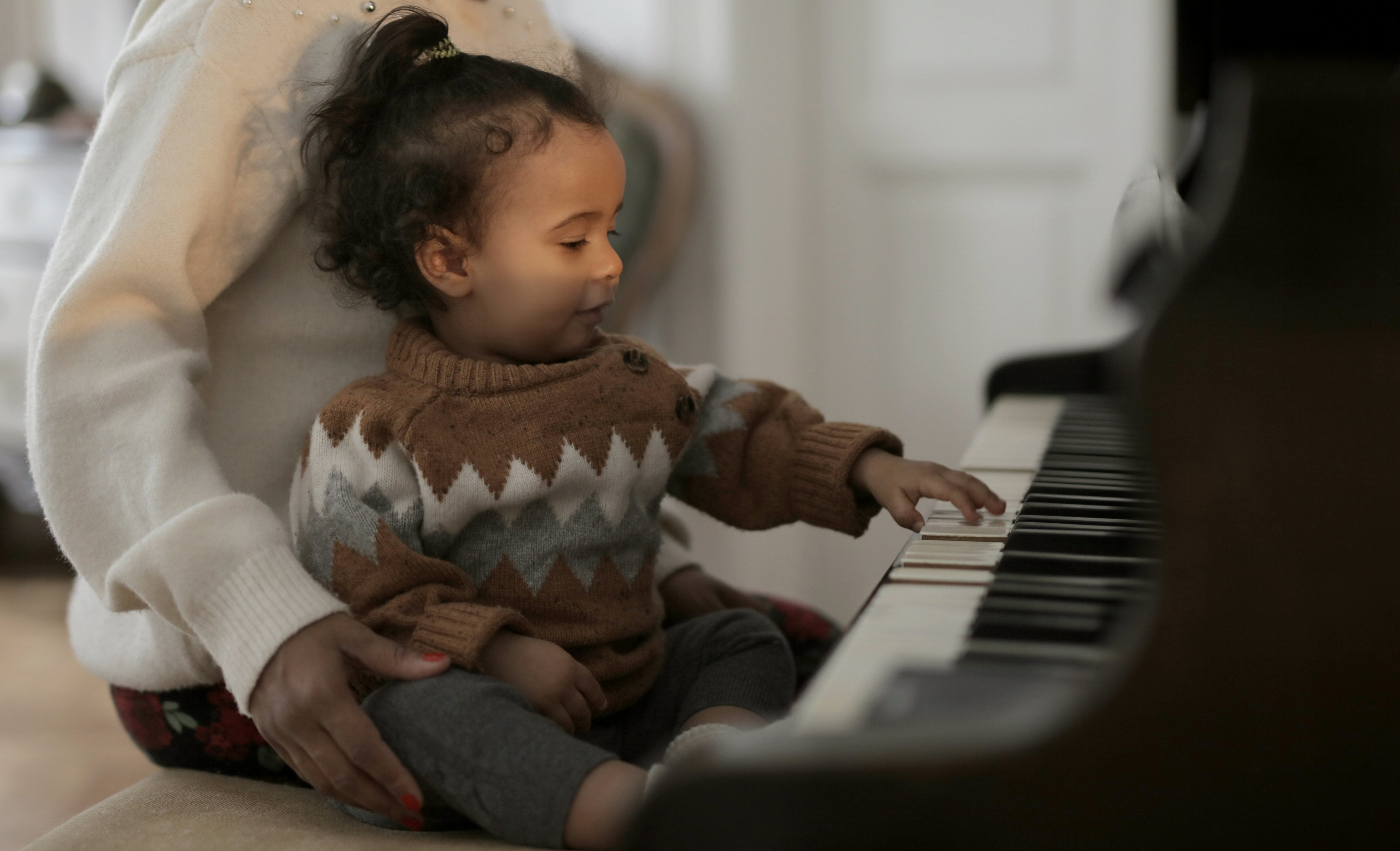 Toddler attends piano lesson at Modern Music Studio in Barrie, Ontario